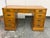 Design Plus Gallery presents a Vintage Campaign Style Oak Pedestal Desk by National Mt. Airy. This traditional desk...