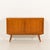 This vintage sideboard comes from the 1970s and shows the quality of mid-century Scandinavian carpentry with solid teak...