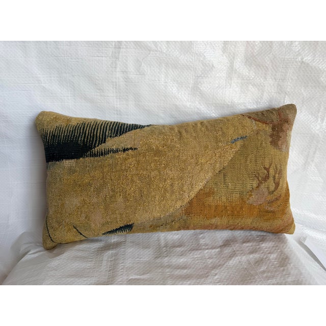 Created from a genuine 17th-century Brussels tapestry, this antique lumbar pillow showcases a beautifully preserved...