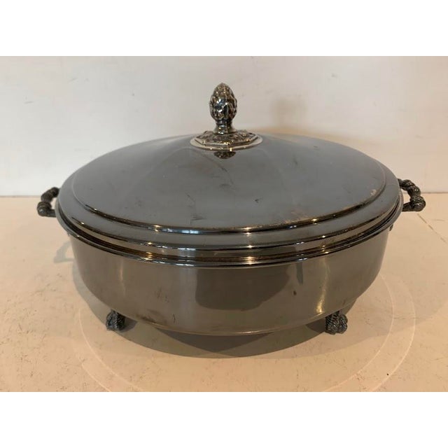 Empire-style covered vegetable dish Tripod base in the shape of claws Pine cone-shaped lid handle Good condition, needs...