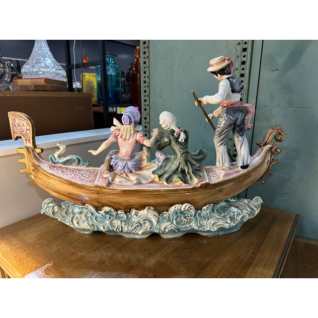 Experience the charm of Venice with this rare vintage Capodimonte ("top of the line") porcelain sculpture titled "A Couple...