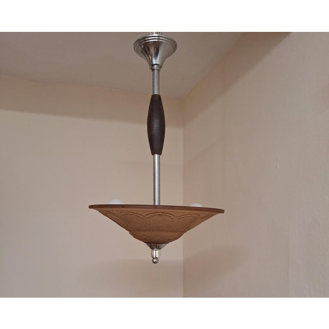 Vintage French Art Deco Pendant Lamp with Pink-Tinted Relief Glass Shade, 1920s, in Good conditions. Designed 1920 to 1949...