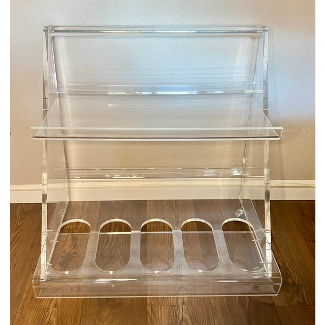 Unfortunately there is no manufacturer's identification on the car, but pieces of this type were designed by different...