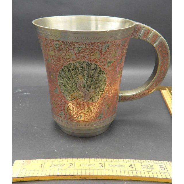 This marvelous vintage 1950s flare-shaped mug is created in a gorgeous unknown silver metal and has intricate engraved...