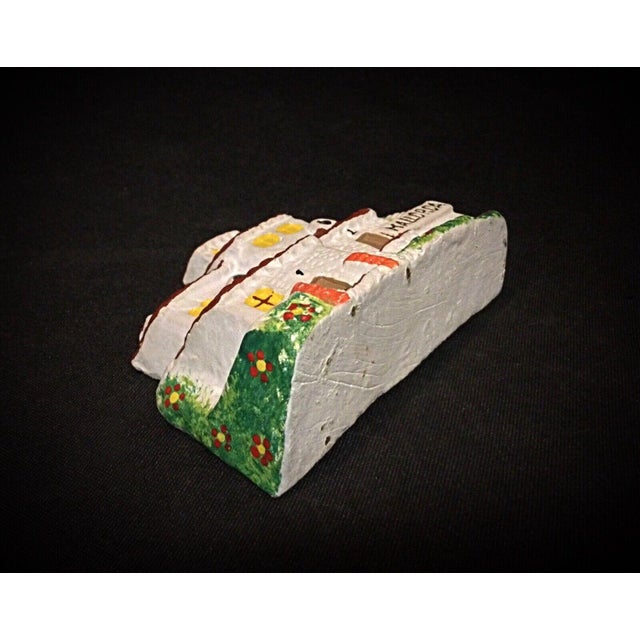 Add a charming touch to your decor with this hand-painted miniature house from Mallorca. Crafted from plaster, this...