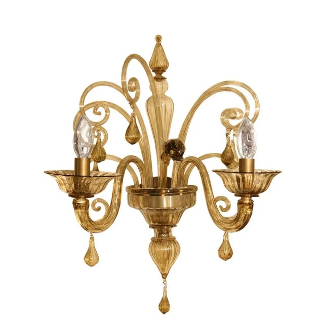 A set of four Venetian sconces, mink colour blown glass component. Made in Italy Murano ca.1940. Measurements: Height: 48...