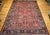 "A captivating example of early 20th-century Persian craftsmanship, this vintage oversized Mahal Sultanabad rug features a...