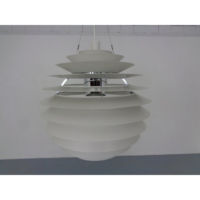 Large version of the PH Louvre pendant lamp. Designed by Poul Henningsen for Louis Poulsen. They come from the savings...