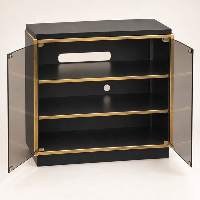 Vintage Roche Bobois-style TV stand from the '70s or '80s with swiveling black and gold-colored shelves. In excellent...