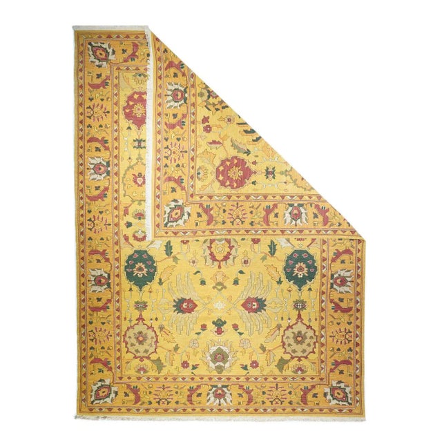 The straw field displays an assortment of ragged palmettes, petal palmettes, paired lazy drooping petal elements along...