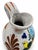 Charming vintage handcrafted ceramic pitcher featuring a light gray glazed body decorated with vibrant, hand-painted blue...