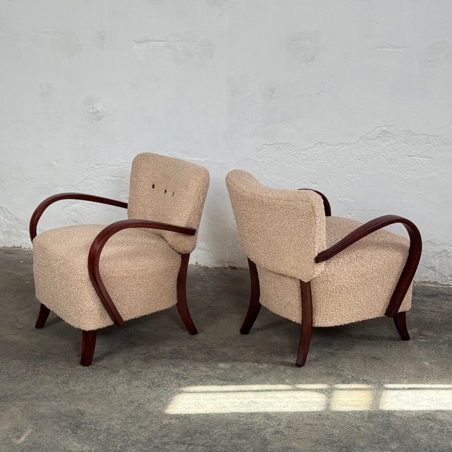 This fully restored pair of armchairs represents the height of czechoslovakian art deco design. Designed by the legendary...