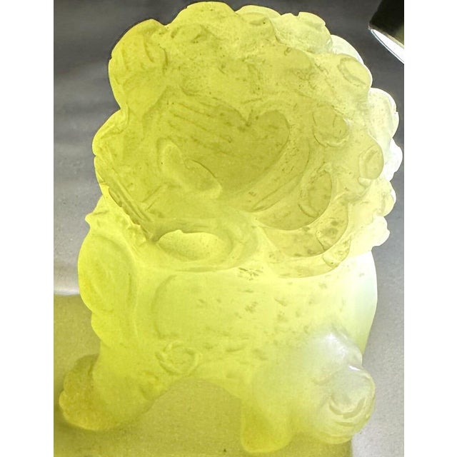 Vintage Hand-Carved Translucent Celadon Jade Female Guardian Lion (Foo Dog) This exquisite vintage figurine depicts a...