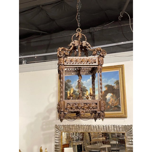 Large scale decorative wrought iron lantern from France. Pretty pattern including leaves and flowers. Very nice!!