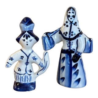 Vintage Blue and White Porcelain Figurine Pair, Hand-Painted Folk Figures For Sale