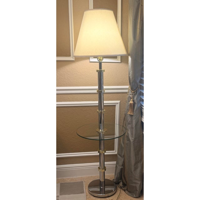 Elevate your living space with this breathtaking 1970s stacked lucite floor lamp. A true statement piece, it features a...
