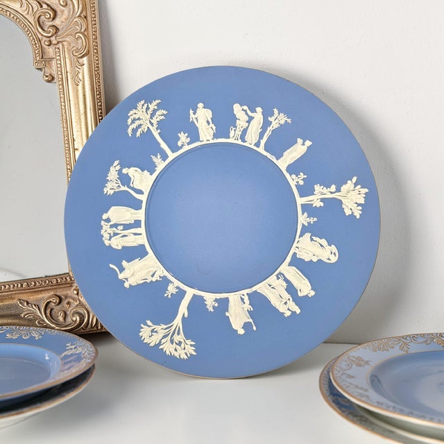 An iconic example of Wedgwood’s Sacrifice pattern rendered in pale blue Jasperware, featuring a continuous neoclassical...