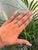 This eternity band features a 1 carat baguette cut emerald and diamond set in 14K yellow gold. Each emerald measuring...