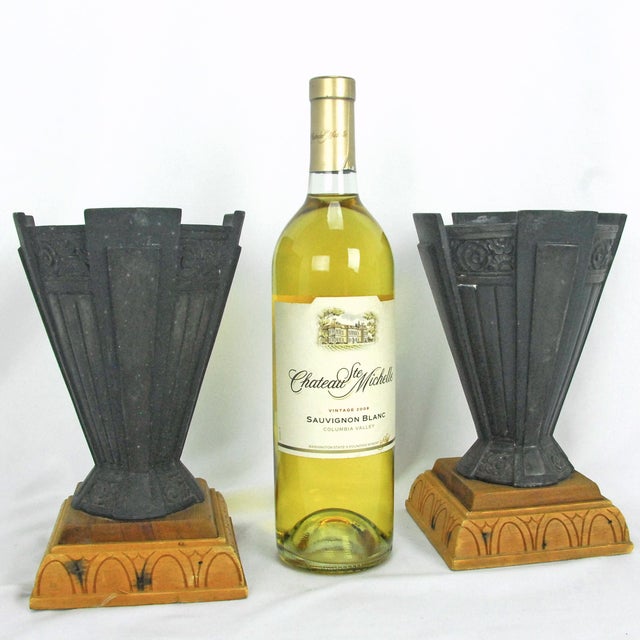 A pair of vintage molded spelter metal Art Deco urns, dating to the 1920s or 1930s. Originally possibly intended for use...