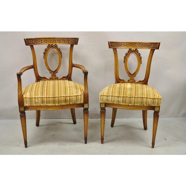 Vintage Italian Neoclassical Style Walnut Greek Key Dining Chairs - Set of 6. Listing includes (2) armchairs, (4) side...