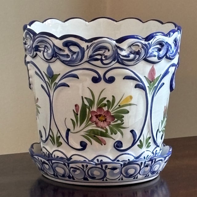 Offering a beautiful RCCL Portugal hand-painted ceramic cachepot from the mid-20th century. This lovely vintage piece...