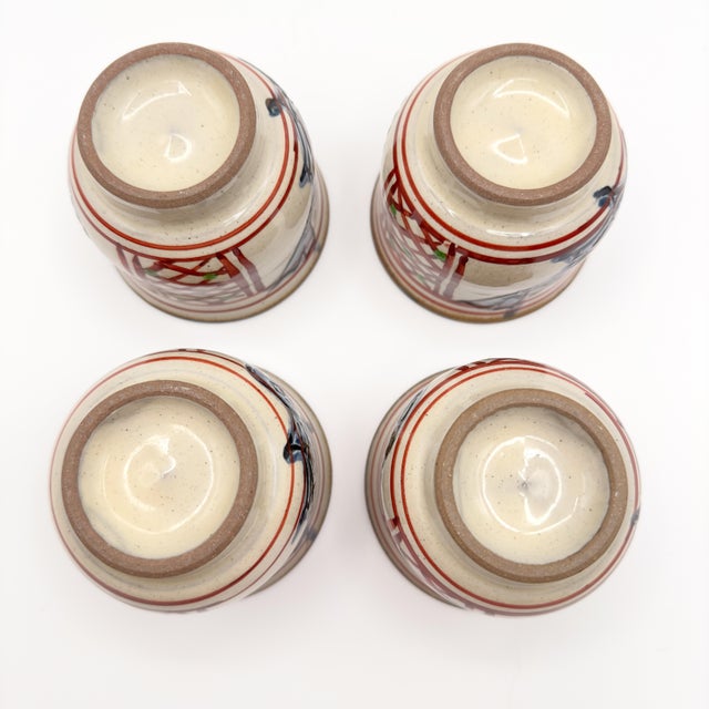 Mid 20th Century Japanese Hand Painted Okinawa Tsuboya-Yaki Pottery Stoneware Tea Cups With Birds Reds Blues Golds- Set of 4 For Sale - Image 9 of 11