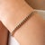 This elegant tennis bracelet features natural round-cut blue sapphires totaling 1.63 carats, set in 14k yellow gold. each...
