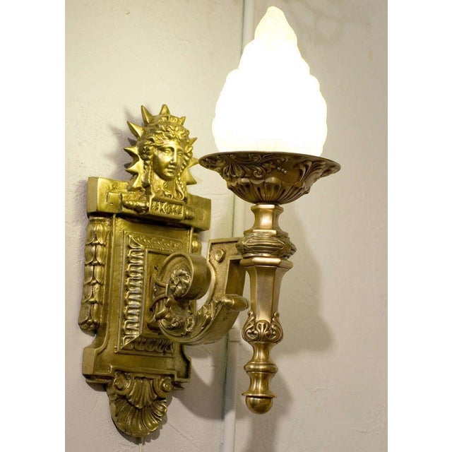 Striking and architectural, this Liberty-style figural sconce brings timeless Art Deco drama to any entry or exterior...