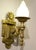 Striking and architectural, this Liberty-style figural sconce brings timeless Art Deco drama to any entry or exterior...