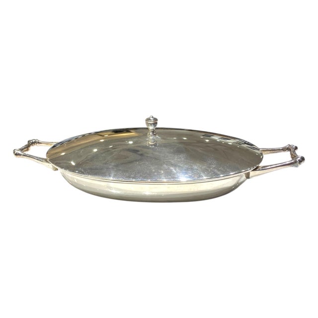 An elegant and highly collectible Arts & Crafts covered serving dish by renowned British designer W. A. S. Benson, stamped...