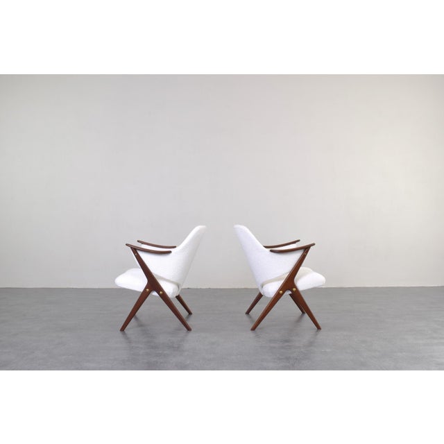 This set of two armchairs model Knott was produced in the 1960s in Norway by Brunstad Møbelfabrikk. The wooden elements...