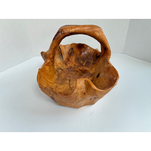 Striking vintage burl wood bowl, hand-carved and organically shaped to showcase the natural beauty of richly figured wood....