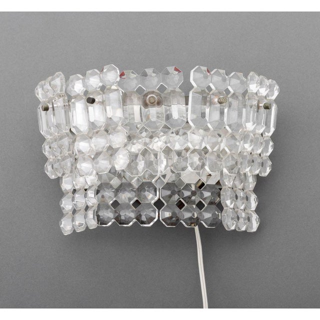 Pair of Italian Clear Faceted Glass Wall-Mounted Sconces. 5" H x 8" W x 4" D. Provenance: From a New York City Collection.