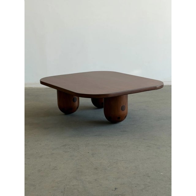 W56 D44.5 H18 The Dug trio coffee table in Maple is a piece handcrafted in house in solid maple and walnut. Featuring...