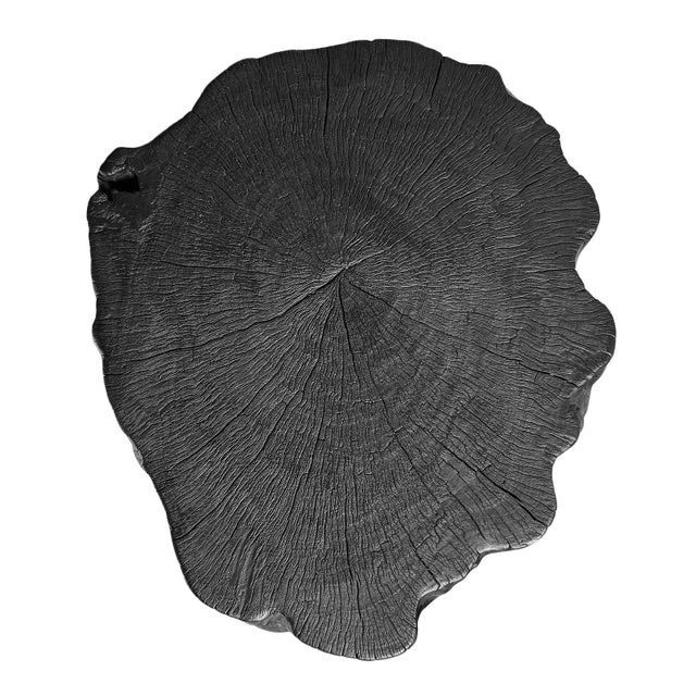 Solid lychee wood stump stool or side table. Attractive modern black finish subtly highlighting the natural wood grain....
