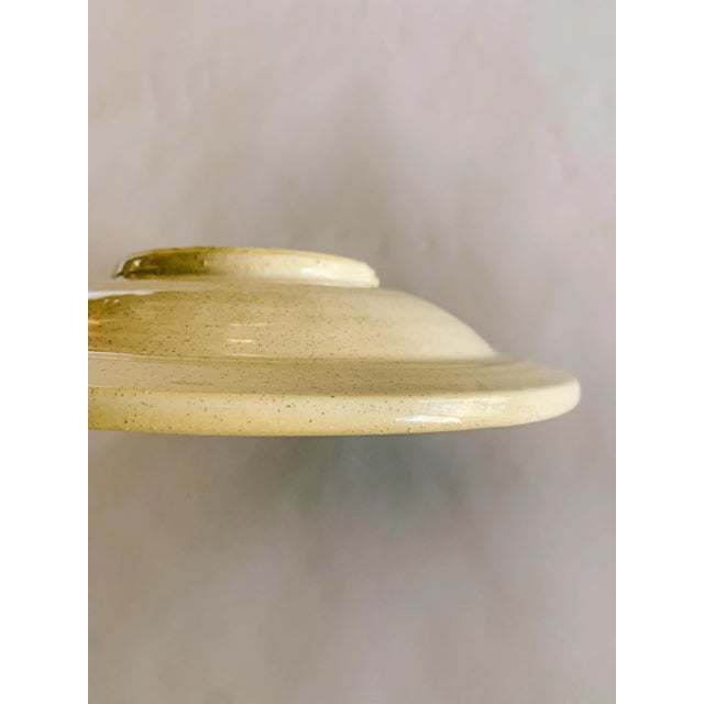 Beautiful bespoke hand painted motif on a studio pottery bowl. Motif is in Spanish or Italian style. Rich yellow, green,...