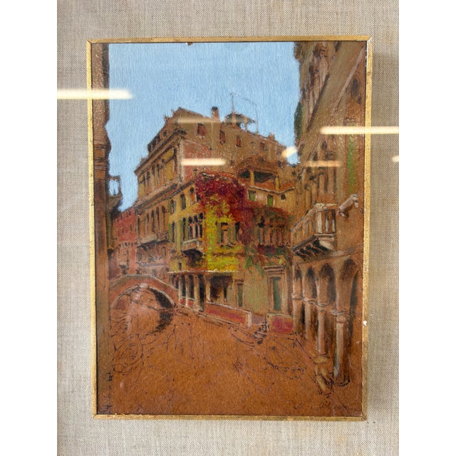 Elegant pair of vintage Italian oil paintings sourced in Parma, Italy, each depicting classic European city scenes...