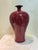 W-12cm,H-22.5cm The Qianlong Marked Red Glaze Porcelain Plum Vase is a vintage original piece of Chinese antiques, crafted...