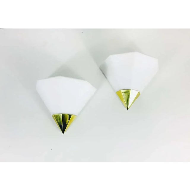 A beautiful pair of Mid-Century Modern wall lamps by Glashütte Limburg made in Germany in the 1970s. They have a beautiful...