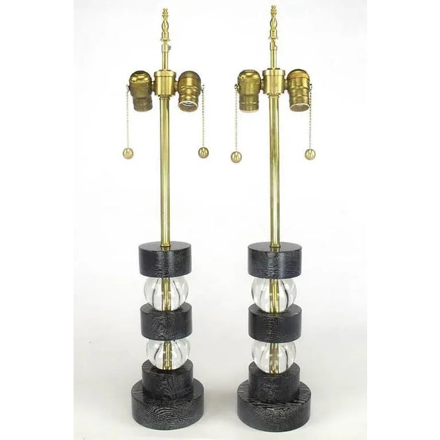 Excellent pair of black lacquered and cerused oak crystal ball segmented table lamps with brass double sockets. Great size...