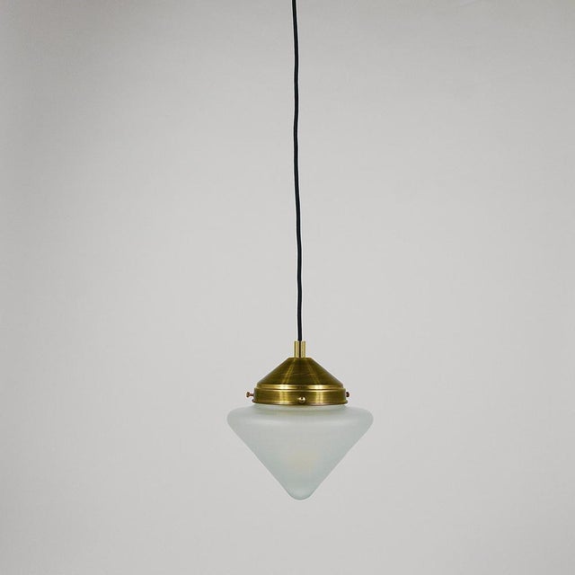 Up to 7 Art Deco Schoolhouse petite pendant lights / hanging lamps from the 1930s, crafted in Vienna, Austria. These...