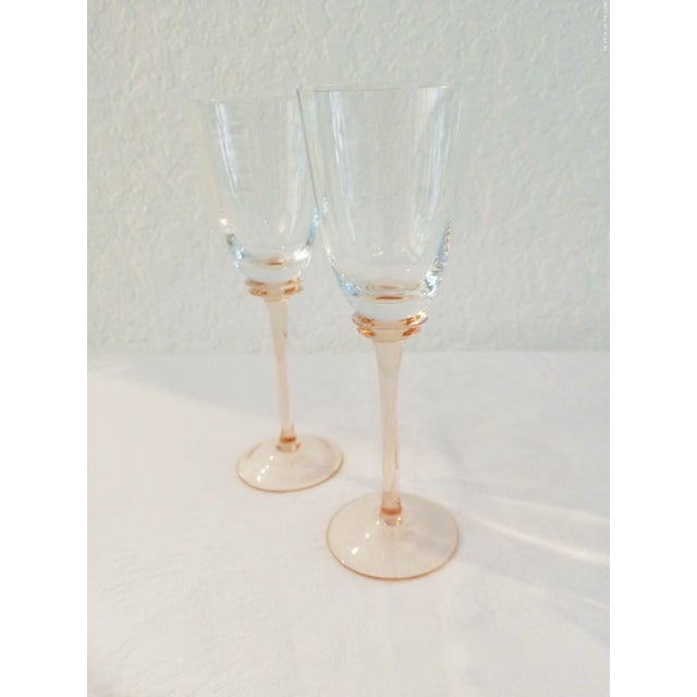 Beautiful set of six mid-century pink stemmed crystal glasses with clear optic bowls. Glasses hold 4 ounces. Excellent...