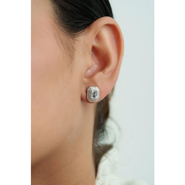 These stud earrings feature 1.23 carats of octagon-cut aquamarines set in 14K White Gold. Each aquamarine measuring...
