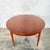 beautifully proportioned mid century Danish extending dining table, crafted in richly grained teak and showcasing the...