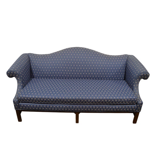 An elegant and understated Ethan Allen American classic Chippendale style sofa. The sofa boasts traditional lines...
