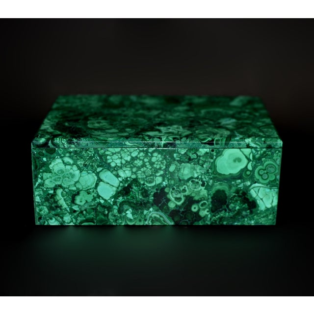 A substantial, jumbo size, hand‑crafted malachite box made from genuine stone, prized for its extra‑large size, measuring...