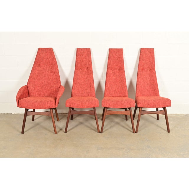 A rare and outstanding set of four Mid-Century Modern high back lounge chairs, club chairs, or dining chairs. By Adrian...