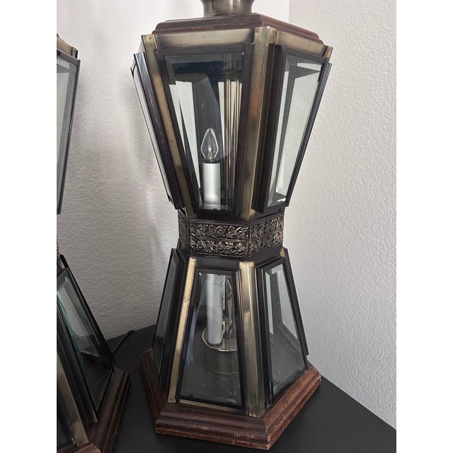 Pair of authentic 1970s Hollywood Regency lantern-style table lamps manufactured by the highly collectible American Lamp...