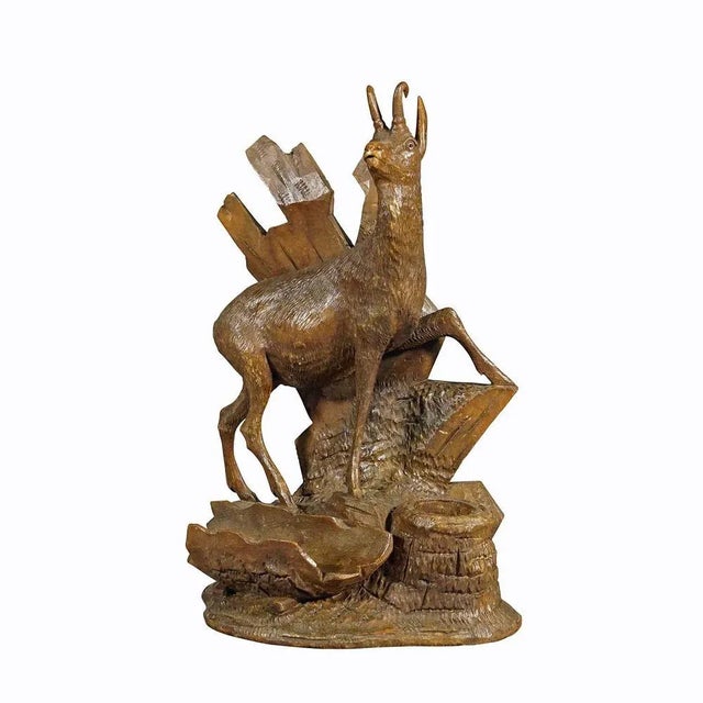 Finely carved wood chamois Brienz, Switzerland circa 1900. A delicately handcarved wood sculpture of a chamois standing on...