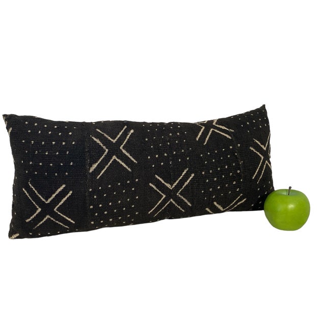 This 19" W b 4"h by 8" D Lumbar pillow showcases a stunning geometric design in black and white, hand made from a vintage...